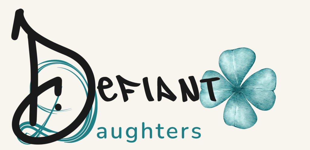 Defiant Daughters logo. A punky font 'Defiant' is overlaid 'Daughters' which has a capital handwritten D and a clean font. To the right is our four-leaf clover symbol.
We don't use the four-leaf clover because we believe in luck. We use it because we believe in us.